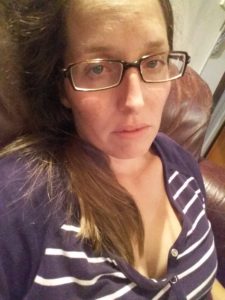In pain and miserable.