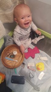 Happily playing while I get ready.