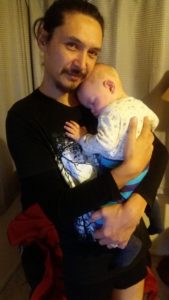 Teething and all he wants is snuggles.