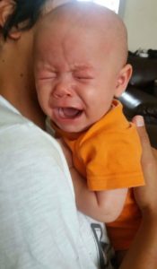 I love his crying face, but I don't love that he's crying.