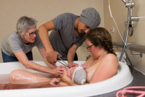 At Ziggys birth. AJ cut the cord with long handled scissors.